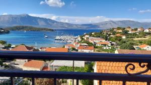 a view of a harbor with boats in the water at Apartments Lumbarda in Lumbarda