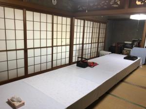 En eller flere senger på et rom på Youyousanso Traditional A