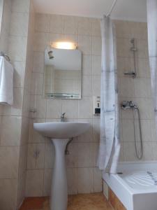 Ванная комната в Hotel Amadeo
