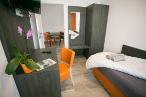 Postel nebo postele na pokoji v ubytování Apartments A7