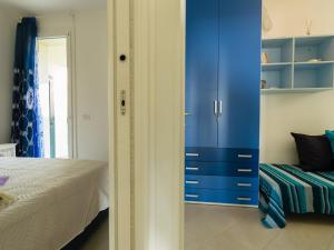 Lova arba lovos apgyvendinimo įstaigoje Borgo dei Fiori - relax and sea view with swimming pool