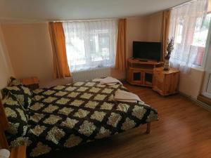 Ένα ή περισσότερα κρεβάτια σε δωμάτιο στο Guest House Shipkovo Hills +21 φωτογραφίες