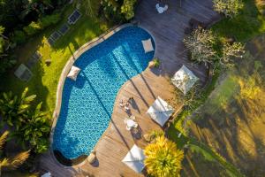 Bazén v ubytování Plataran Ubud Hotel & Spa - CHSE Certified nebo v jeho okolí