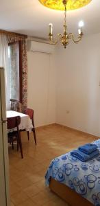 Ένα ή περισσότερα κρεβάτια σε δωμάτιο στο Apartman Veliki Pijesak +7 φωτογραφίες