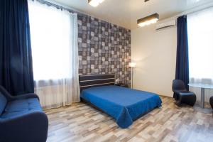 Postel nebo postele na pokoji v ubytování Studio apartment in the Heart of Kharkiv - Darvina str. 17/2