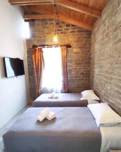Posteľ alebo postele v izbe v ubytovaní Agora Boutique Apartments Ioannina