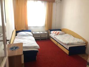 Postel nebo postele na pokoji v ubytování ANNA - Borsodi