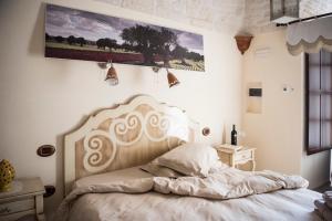 Łóżko lub łóżka w pokoju w obiekcie Savito Guest House
