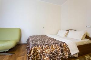 Una cama o camas en una habitación de Excellent studio apartment in the Center - Kravtsova lane 13B