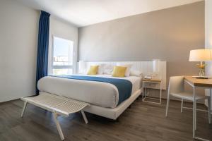 
Cama o camas de una habitación en Hotel Agaró
