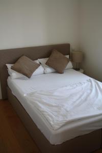 Кровать или кровати в номере Apartment 1