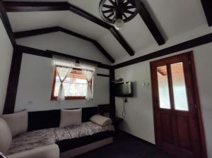 Posteľ alebo postele v izbe v ubytovaní Kolibica