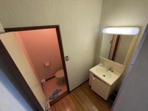 Koupelna v ubytování Hotel Isodokei