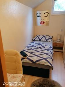 Postel nebo postele na pokoji v ubytování Kuća za odmor Tina