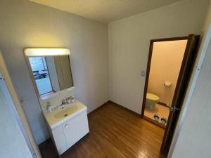 Koupelna v ubytování Hotel Isodokei
