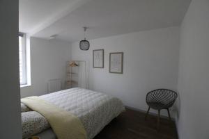 Ένα ή περισσότερα κρεβάτια σε δωμάτιο στο L Euphorie - Maison de ville de caractère 7 minutes de la mer - Le Treport - Mers les Bains