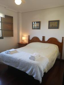 Posteľ alebo postele v izbe v ubytovaní Apartamento Ruiloba