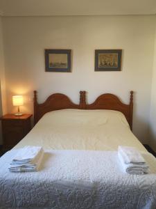 Posteľ alebo postele v izbe v ubytovaní Apartamento Ruiloba