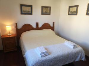 Posteľ alebo postele v izbe v ubytovaní Apartamento Ruiloba