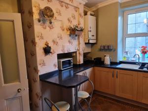 O bucătărie sau chicinetă la 4Br Sea View Escape-Near Snowdonia& Coastal Trails