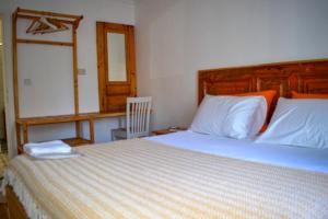 Postel nebo postele na pokoji v ubytování merih butik hotel