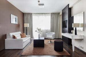 Televízia a/alebo spoločenská miestnosť v ubytovaní Hotel Diva SPA