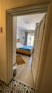 Postel nebo postele na pokoji v ubytování merih butik hotel