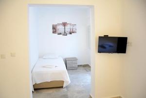 TV a/nebo společenská místnost v ubytování Gumbet Hotel