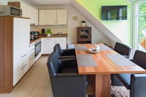 Kuchyň nebo kuchyňský kout v ubytování Ferienwohnung-Auszeit