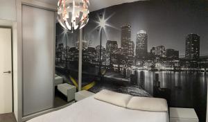 A bed or beds in a room at Tunel10