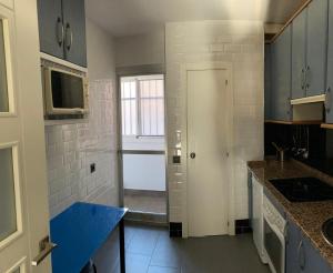 A kitchen or kitchenette at Tunel10
