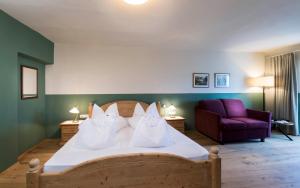 Letto o letti in una camera di Hotel Ansitz Rungghof