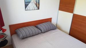 Ένα ή περισσότερα κρεβάτια σε δωμάτιο στο Vila Una