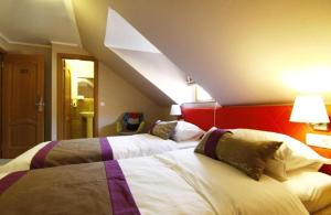 Ein Bett oder Betten in einem Zimmer der Unterkunft CASA GRINDA
