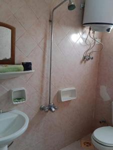Ванна кімната в Kelany Hotel