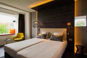Krevet ili kreveti u jedinici u okviru objekta Golden Tulip Zoetermeer - Den Haag