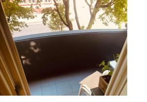 a view from a balcony of a fence at Friends Apartment in Słupsk