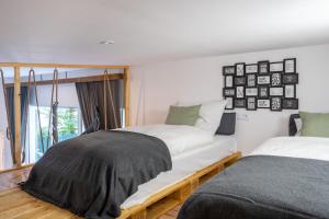 Posteľ alebo postele v izbe v ubytovaní Staymoovers - Secret Loft w pobliżu Krakowa