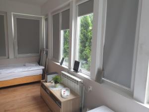 Posteľ alebo postele v izbe v ubytovaní blatoapartament