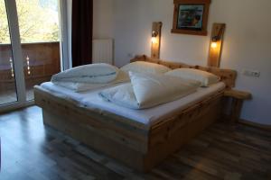 Voodi või voodid majutusasutuse Gasthof zum Löwen toas
