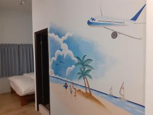 Postel nebo postele na pokoji v ubytování Yueli Homestay
