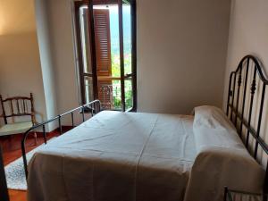 Postel nebo postele na pokoji v ubytování Locanda del Brinsc