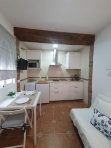 Kuchyň nebo kuchyňský kout v ubytování Hostal Canalejas
