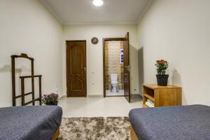 Postel nebo postele na pokoji v ubytování Guest House NAUKA#54