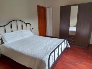 Postel nebo postele na pokoji v ubytování Locanda del Brinsc