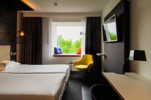 Krevet ili kreveti u jedinici u okviru objekta Golden Tulip Zoetermeer - Den Haag