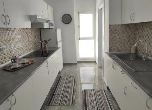 Kuchnia lub aneks kuchenny w obiekcie ApartaSol
