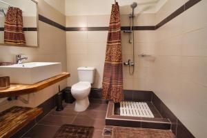 Koupelna v ubytování Hotel Petradi