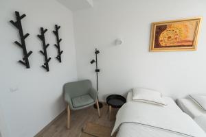 Postel nebo postele na pokoji v ubytování Casa Botár Vendégház