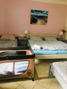 Postel nebo postele na pokoji v ubytování Apartmán U ŘEKY